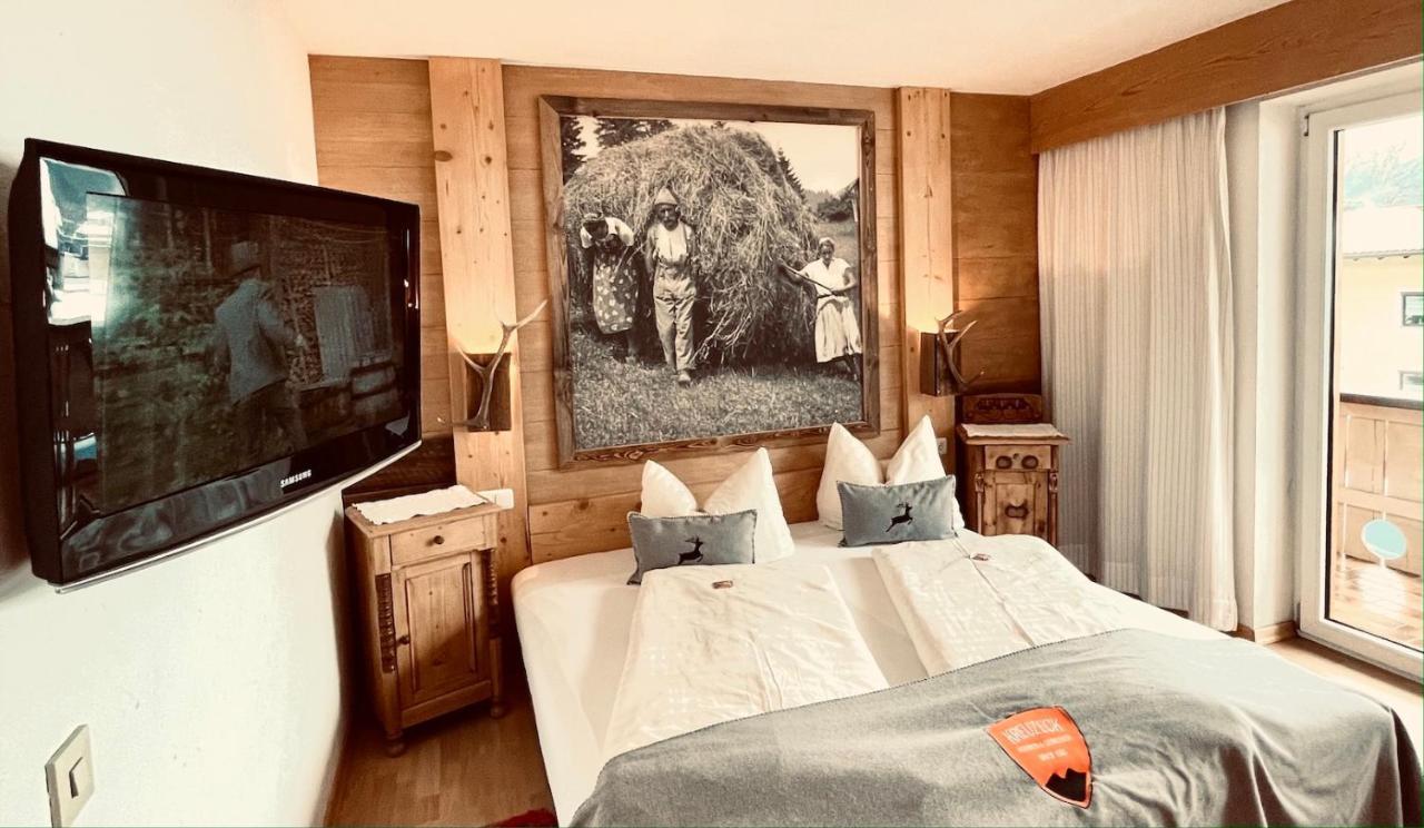 Pension Kreuzeck - Dein Gluecksplatz Am Lech ヴァイセンバッハ・アム・レッヒ エクステリア 写真
